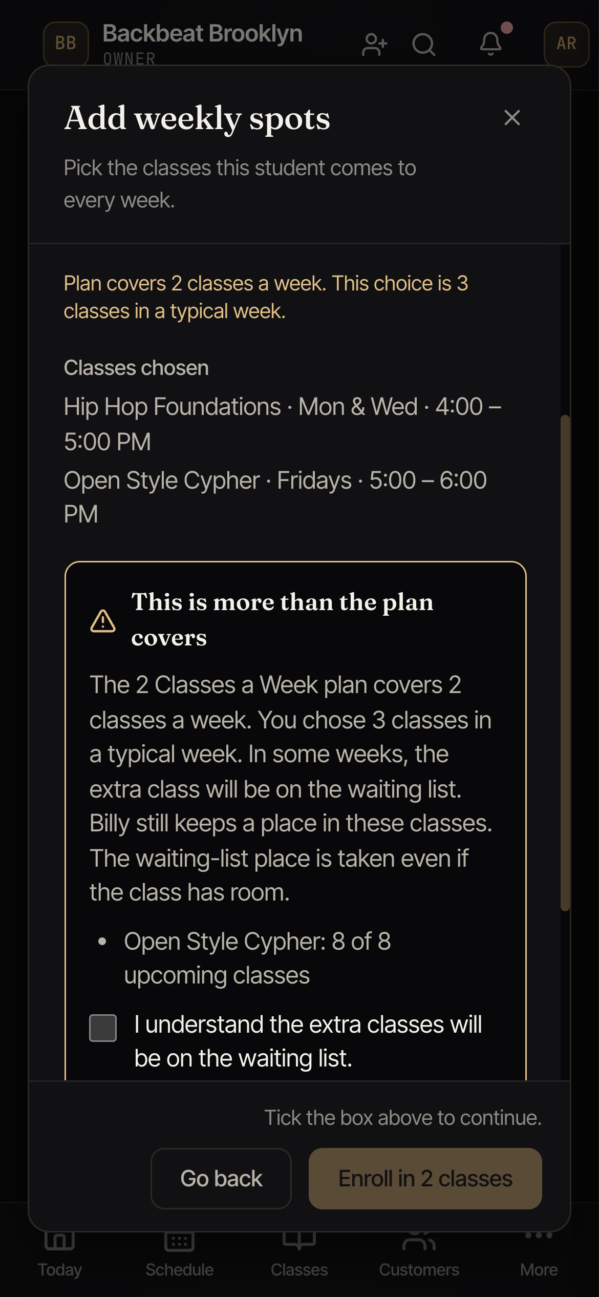The message This is more than the plan covers, explaining that the 2 Classes a Week plan covers 2 classes a week, with a box to tick before you can enroll.
