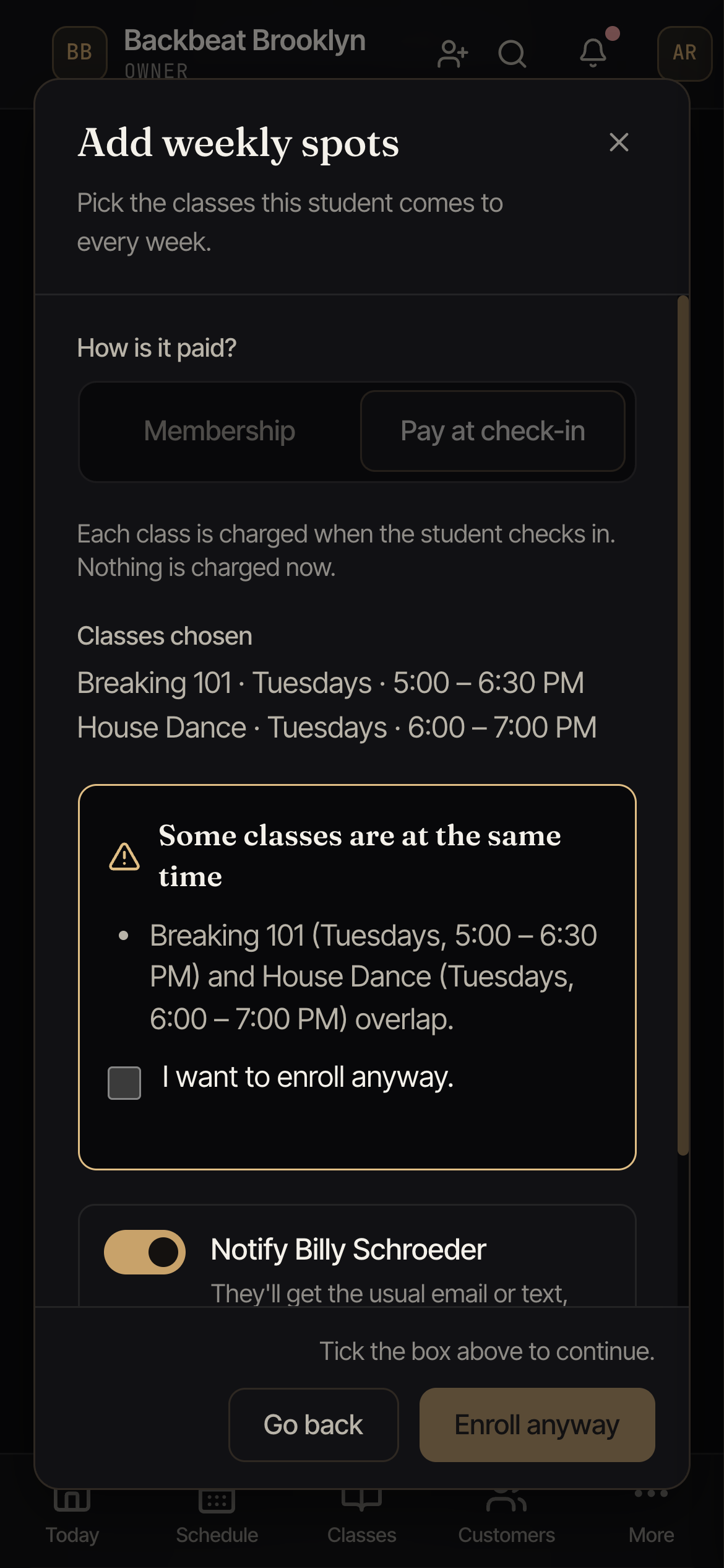 The message Some classes are at the same time, listing Breaking 101 and House Dance on Tuesdays, with an I want to enroll anyway box.
