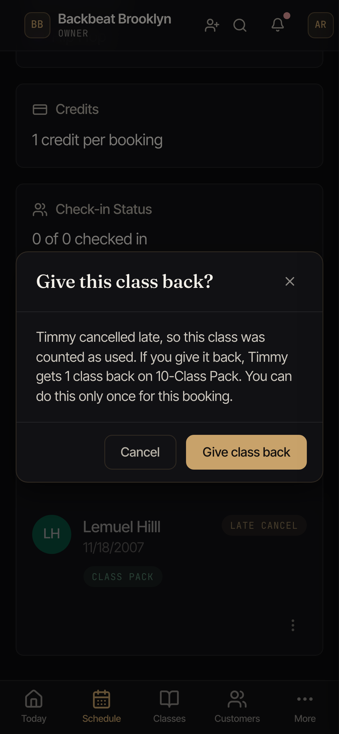 A confirmation window titled Give this class back, saying the student cancelled late and will get 1 class back on their class pack.